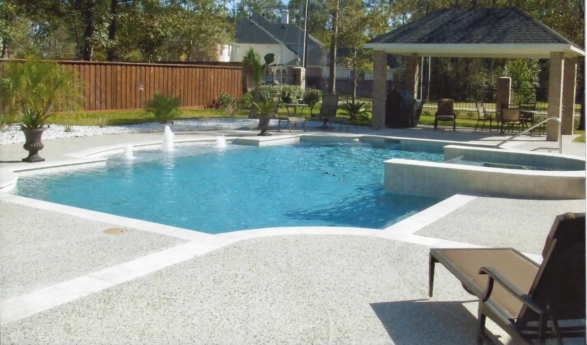 Pool, Infinity Hot Tub, Shade Structure, Landscaping